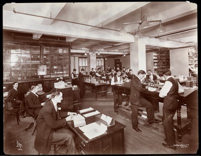 Men Filling Orders in an Office at Parke, Davis and Co., Chemists, Hudson and Vestry Streets, New York, 1910 by Byron Company